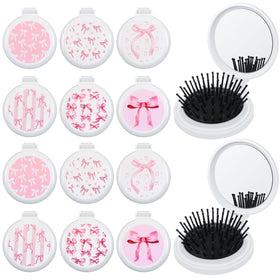 Meanplan pink bow folding mirror brush for on-the-go styling and touch-ups
