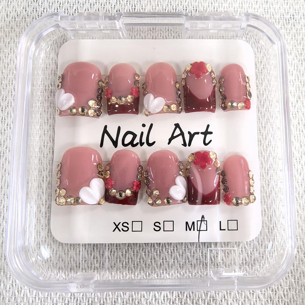 Meemooron glossy finish nails showcase delicate 3D floral details for elegant occasions.