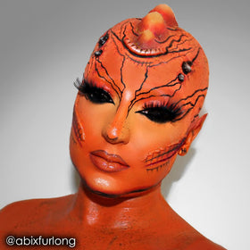 Mehron CreamBlend Orange on skin demonstrates smooth, blendable coverage