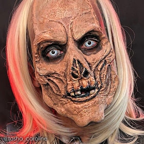 Mehron Liquid Latex Light Flesh with cotton texture for scars.