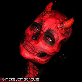 Mehron Paradise Makeup AQ Beach Berry application on skin for bold body art.