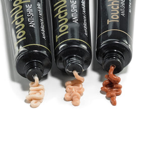 Mehron TouchUp Anti-Shine Gel used on prosthetics to remove glare.