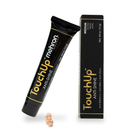 Mehron TouchUp Anti-Shine Gel on skin for a matte, shine-free look.
