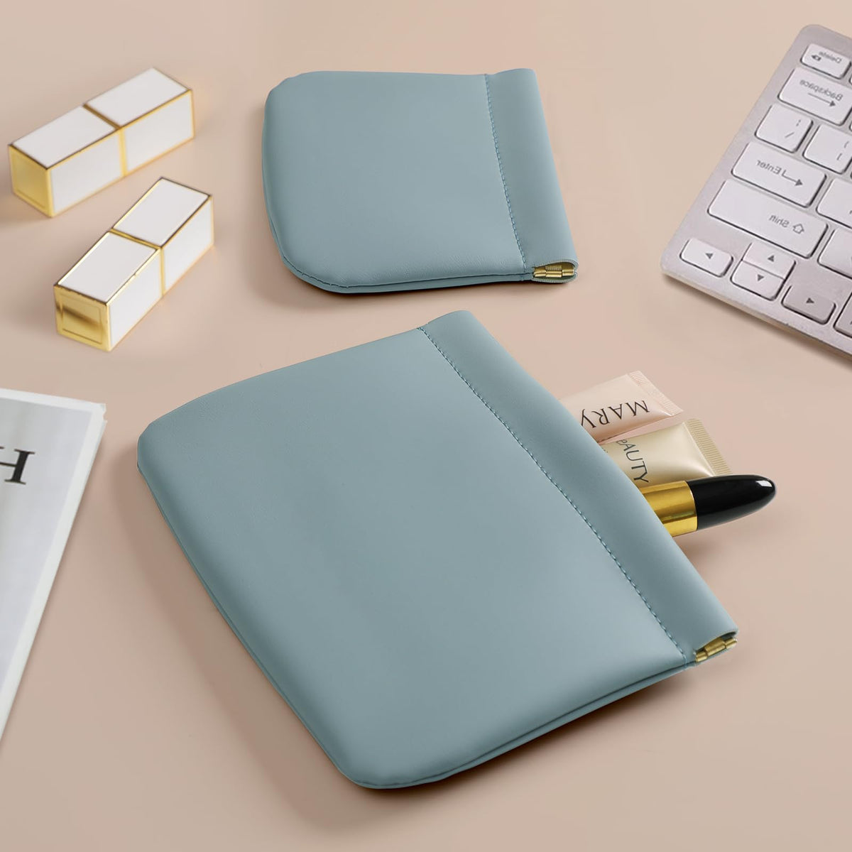 MEIBOOCH travel-friendly blue pouch shown in a daily-use setting.