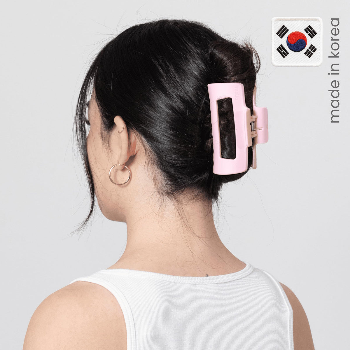 MELLO hair claw clip on headrest shows flush profile for driving and lounging.