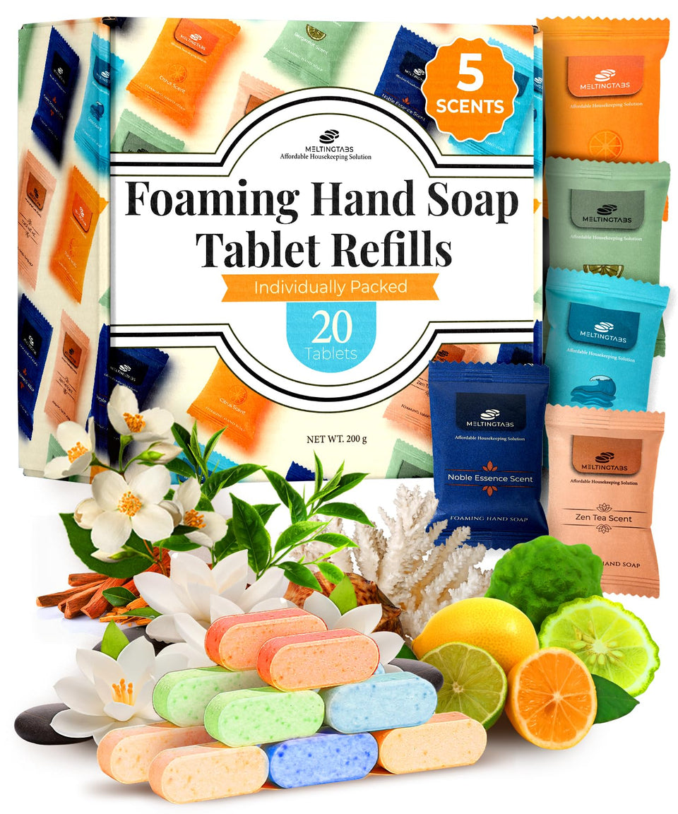 MELTINGTABS Citrus tablet dissolving in water to create fresh foaming soap.