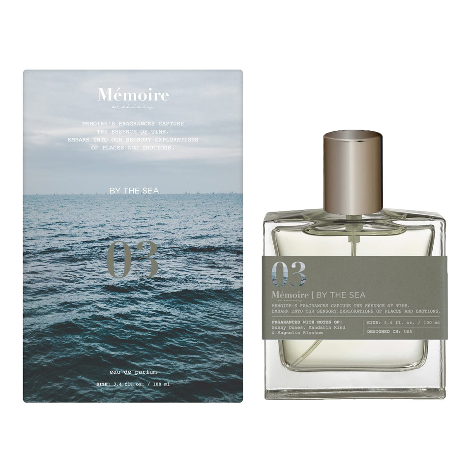 Memoire Archives By The Sea EDP bottle on a sunlit surface evokes fresh coastal confidence