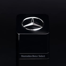 Lifestyle shot of Mercedes-Benz Select Night for a luxury fragrance collection.