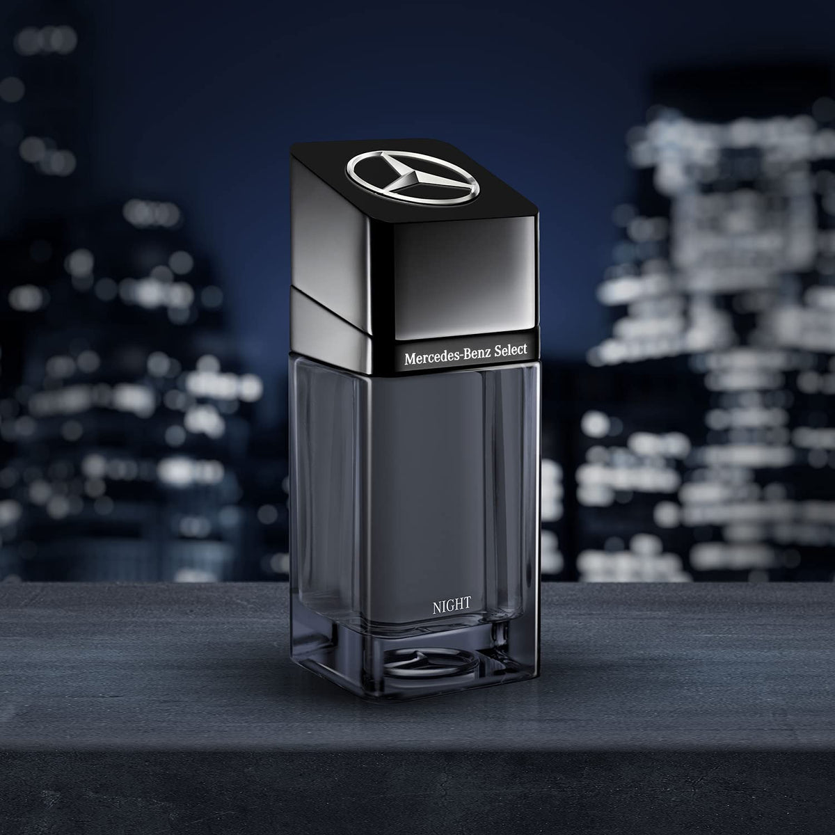 Etched label on Mercedes-Benz Select Night bottle emphasizing luxury craftsmanship.
