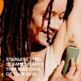 MERIDIAN trimmer blade attachment click shows secure fit.