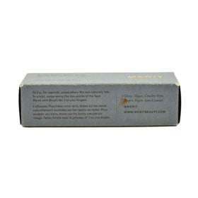 Merit Bronze Balm Quince packaging closeup highlights portable design.