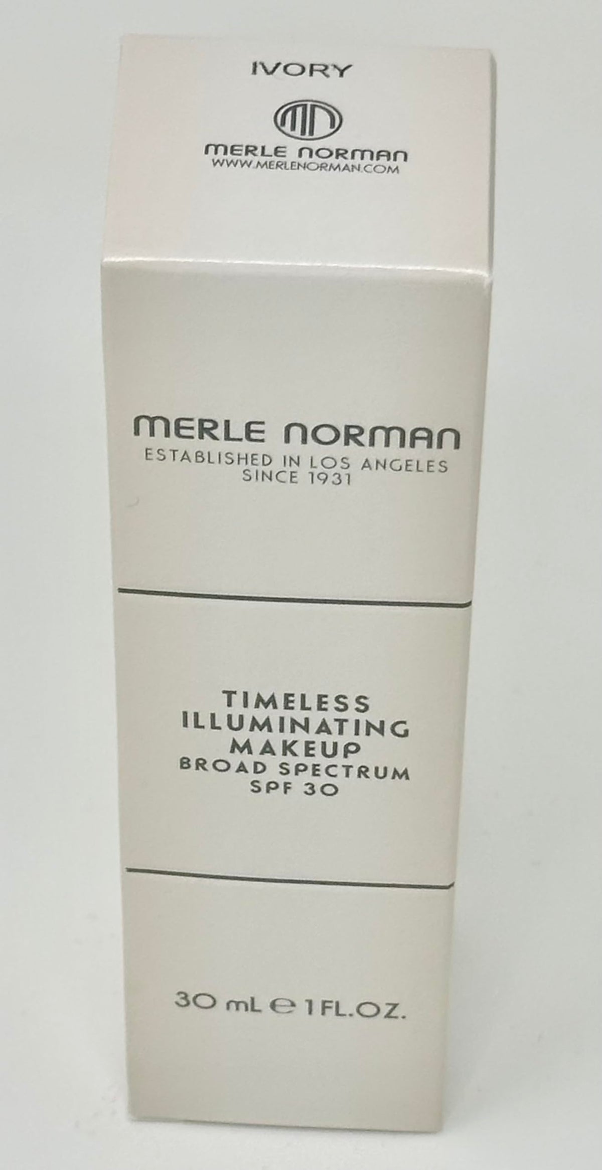 Merle Norman Timeless Illuminating Makeup Ivory brush application demonstrating buildable coverage.