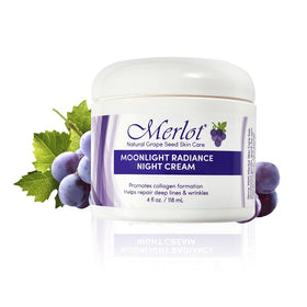 Merlot Moonlight Radiance night cream bottle set for nightly skincare ritual.