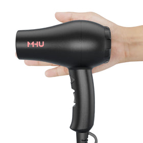 MHU mini blow dryer side view showing compact travel-friendly design