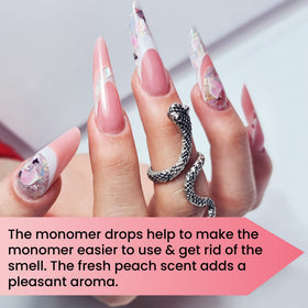 Mia Secret Monomer Drops Peach bottle on a busy salon desk
