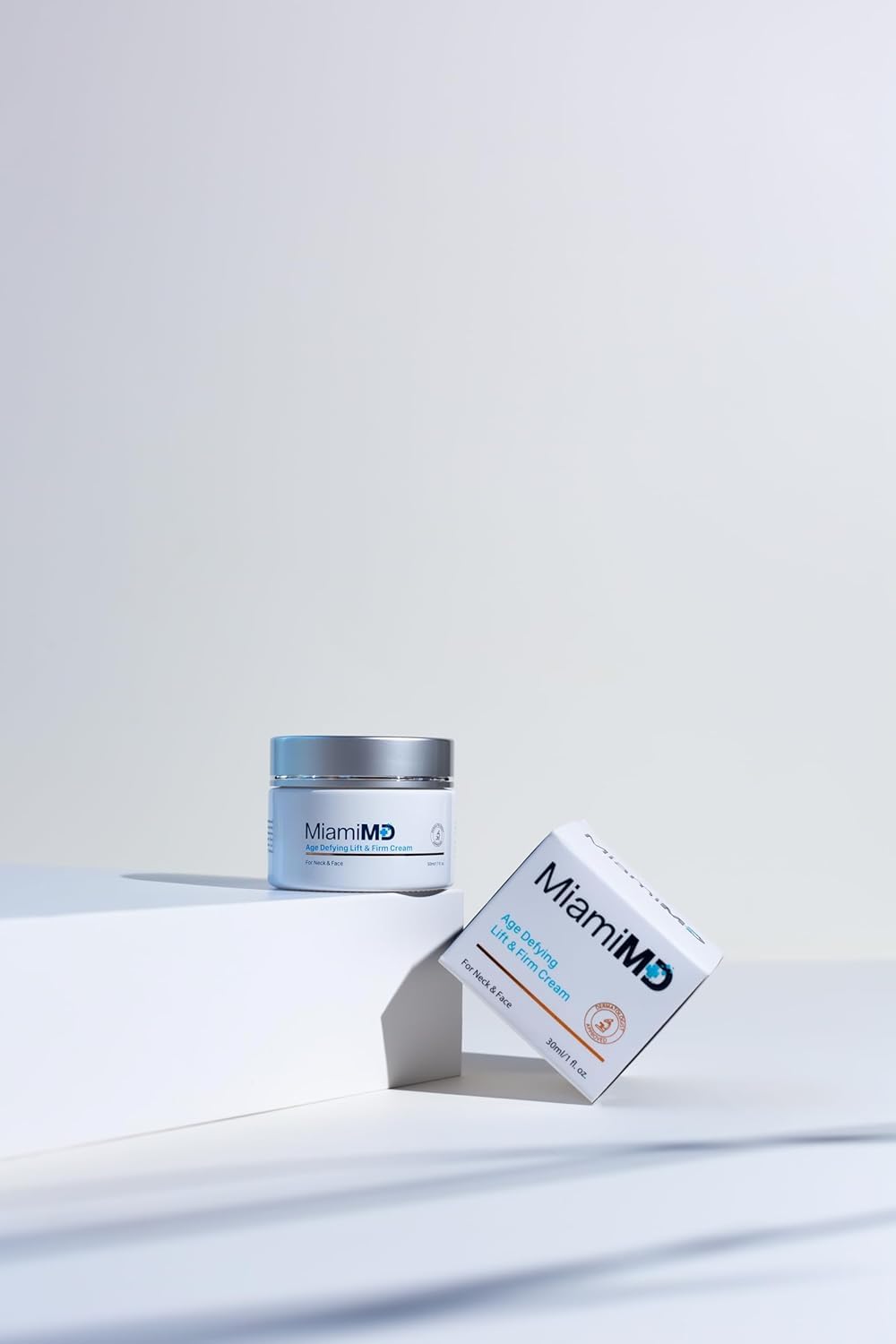 User applying cream in skincare routine for firming support.