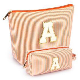 mibasies 2pc initial makeup bags Orange A front view, compact travel-ready design