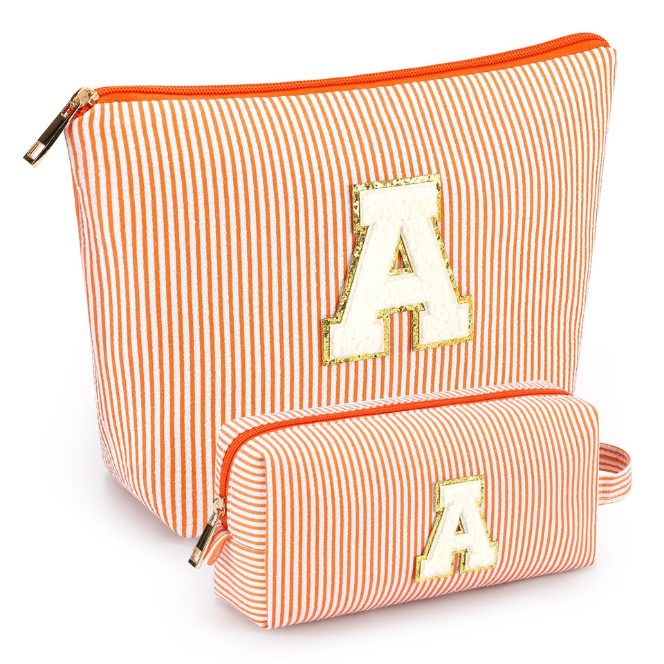 mibasies 2pc initial makeup bags Orange A front view, compact travel-ready design
