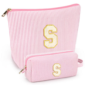 Mibasies two-pack initial makeup bags in light pink for travel