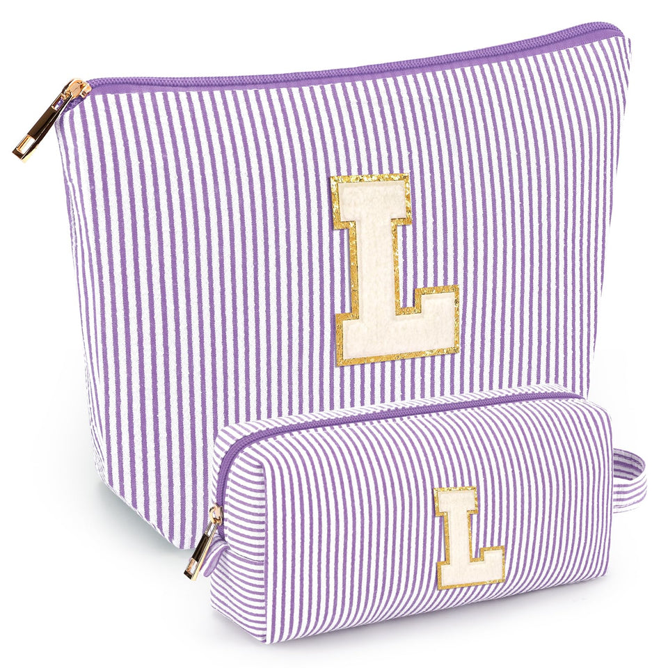 Mibasies two-pack initial makeup bags in purple, front view for organized travel.