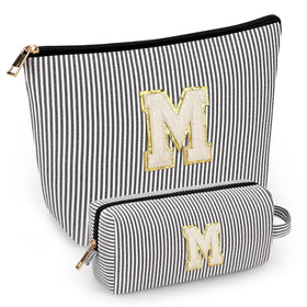 Mibasies two-piece initial makeup bags pair for gifting and organization.