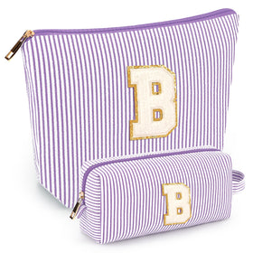 Mibasies two-piece initial makeup bags in compact travel size for easy packing