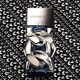 Michael Kors Pour Homme EDP spray release captured in a sleek atomizer.