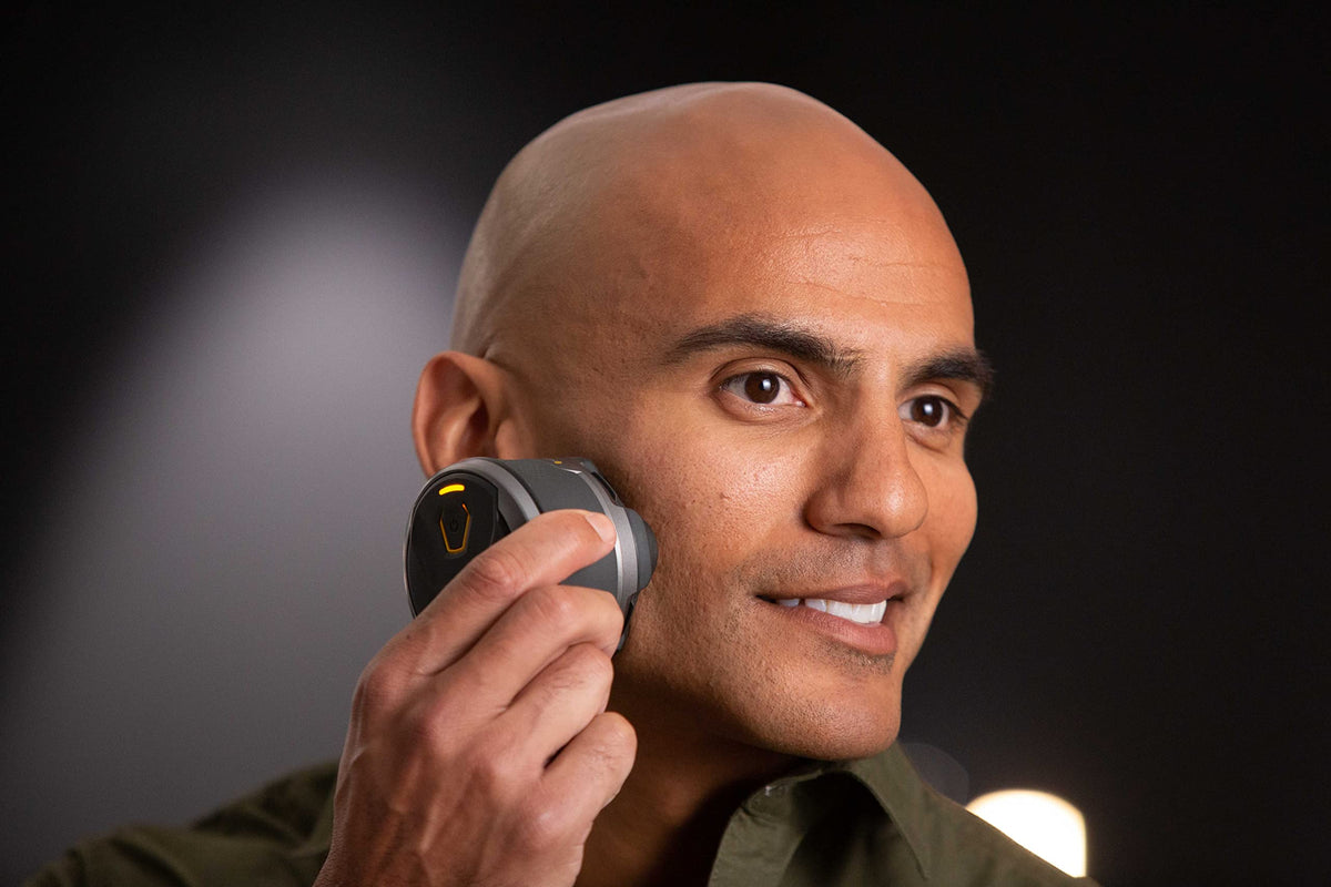 MicroTouch Titanium Head Shaver featuring German blades for durability and sharpness.