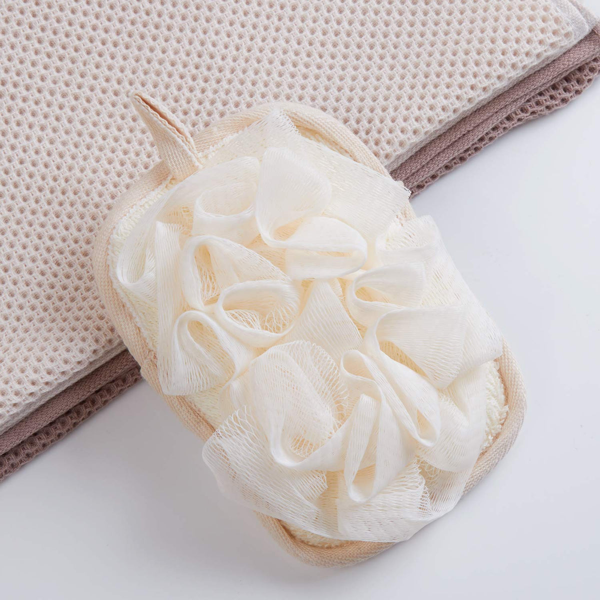 Mikimini bath mitt and loofah combo provides gentle exfoliation.