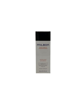 Milbon Anti Frizz Defrizzing Shampoo bottle, lightweight hydration for smoother hair.
