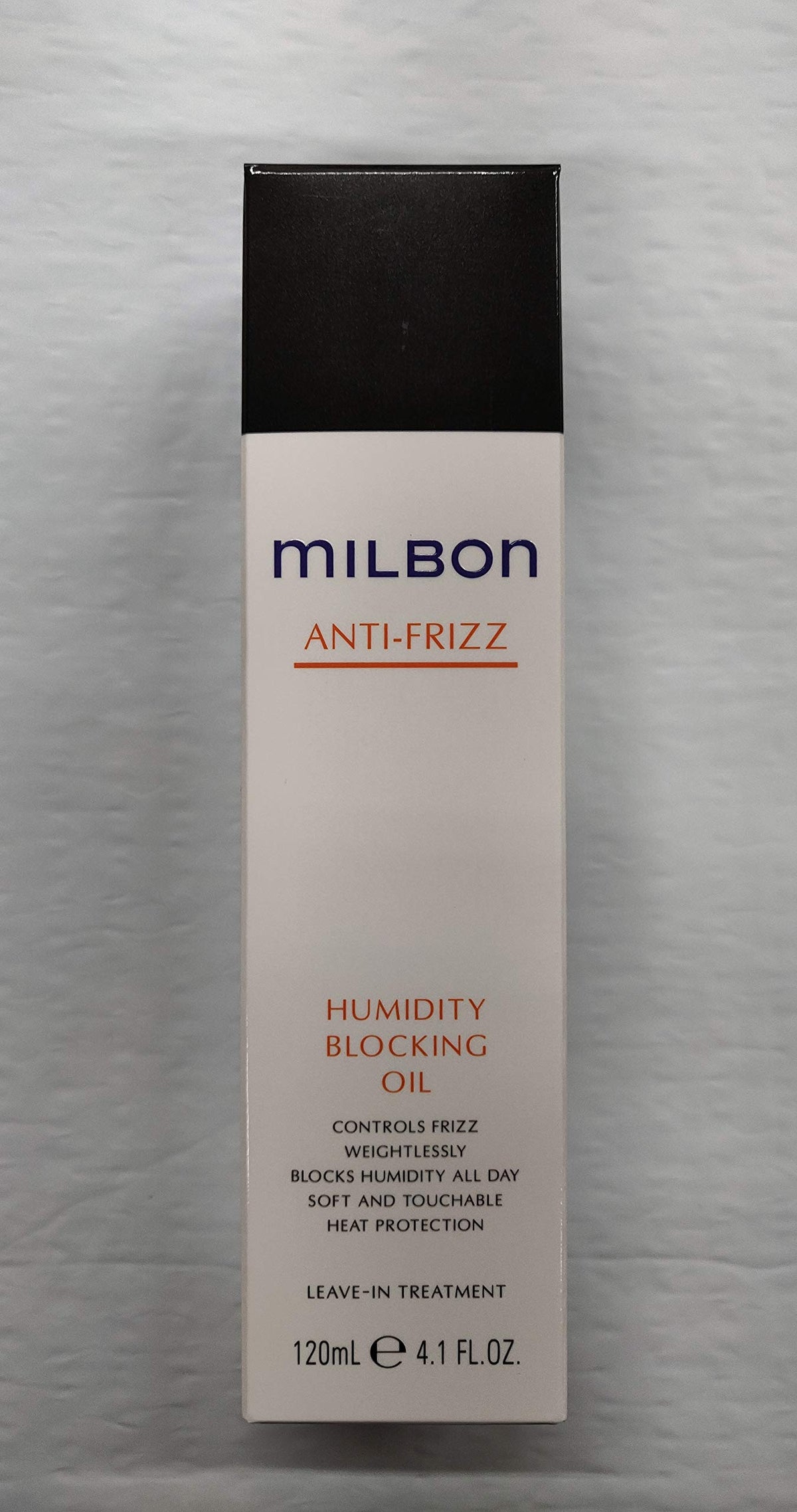 Milbon Anti-Frizz Humidity Blocking Oil bottle offers frizz control and lightweight heat protection.
