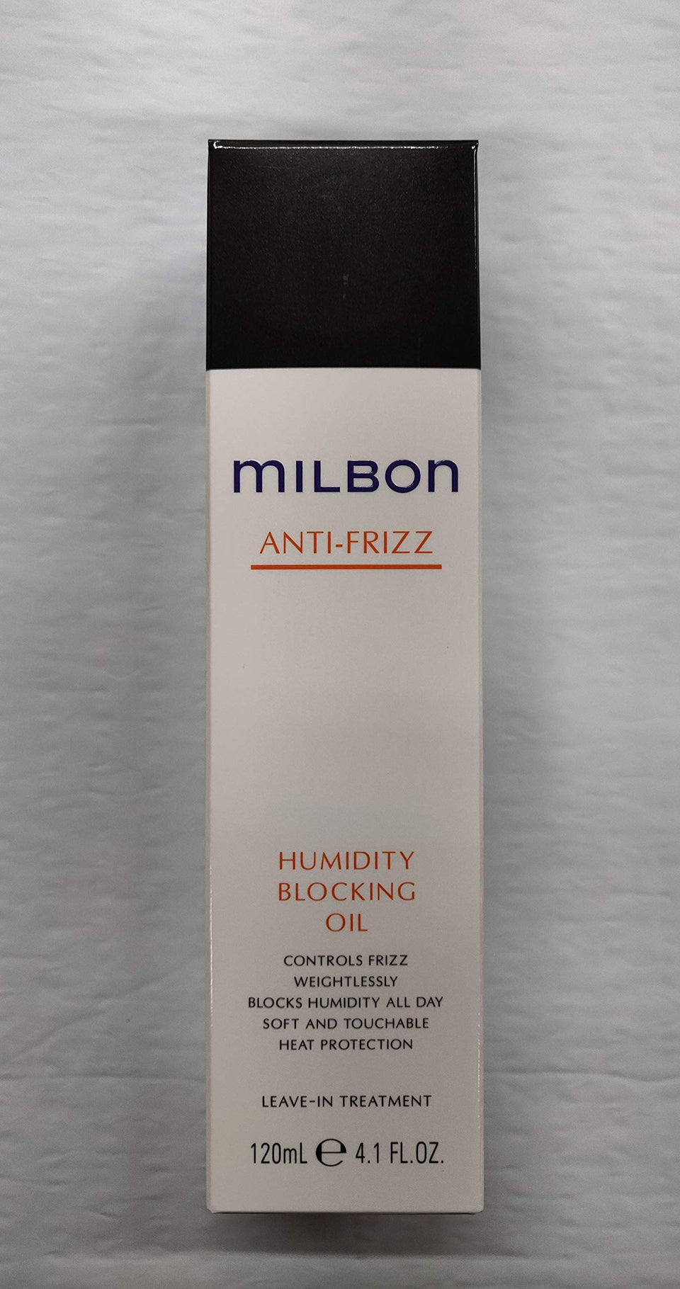 Milbon Anti-Frizz Humidity Blocking Oil bottle offers frizz control and lightweight heat protection.
