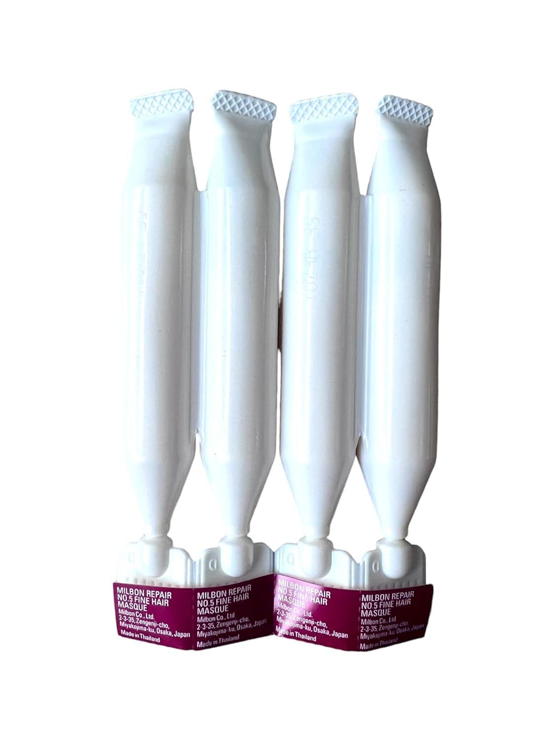 Milbon Repair No. 5 packaging on shelf, convenient weekly repair for fine hair
