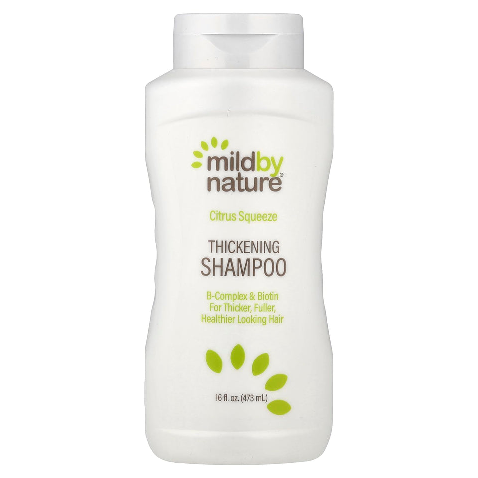 MILD BY NATURE Hair Thickening Shampoo bottle showing citrus scent for fuller look.