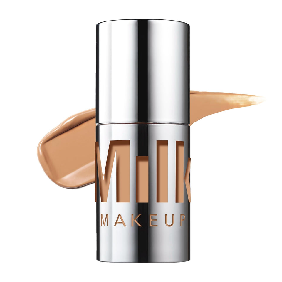 Milk Makeup Future Fluid concealer tube close-up showing creamy texture for natural coverage and hydration