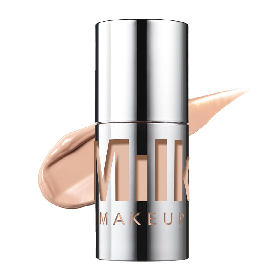 Milk Makeup Future Fluid Concealer tube closeup shows creamy coverage and smooth finish.