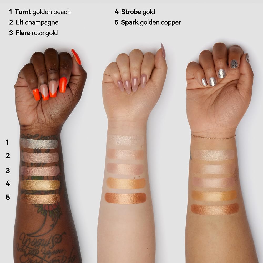 Milk Makeup Highlighter on shoulders brings soft, healthy sheen.