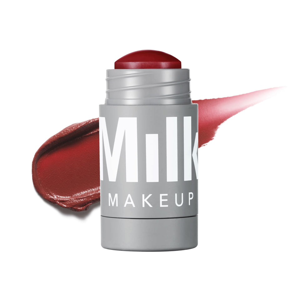 Milk Makeup Lip + Cheek Stick Muse swatch shows deep burgundy shade for cheeks and lips.