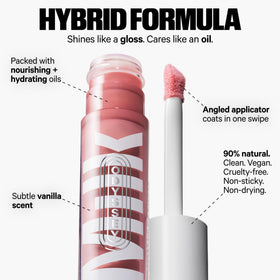 Milk Makeup Odyssey Lip Gloss wand-closeup shows even texture and long-lasting gloss.
