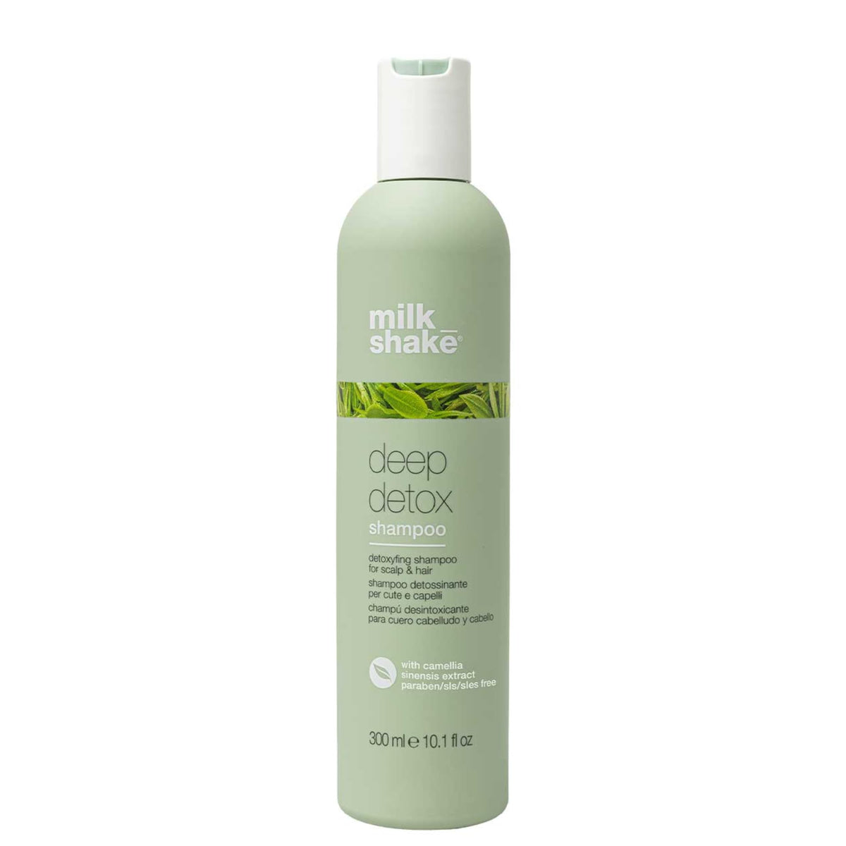 Milk Shake Deep Detox Shampoo bottle close-up highlights green tea extract for nourishing scalp-to-ends.
