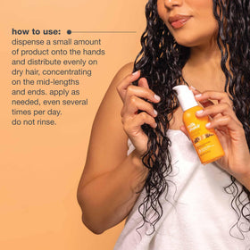 Milk_Shake Moisture & More Serum on shiny, combable hair close-up.