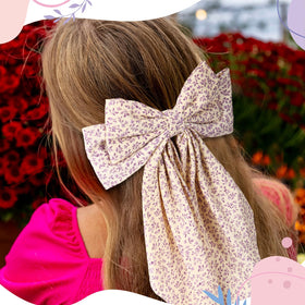 Mimorou metal French-clip keeps bows firmly in place.