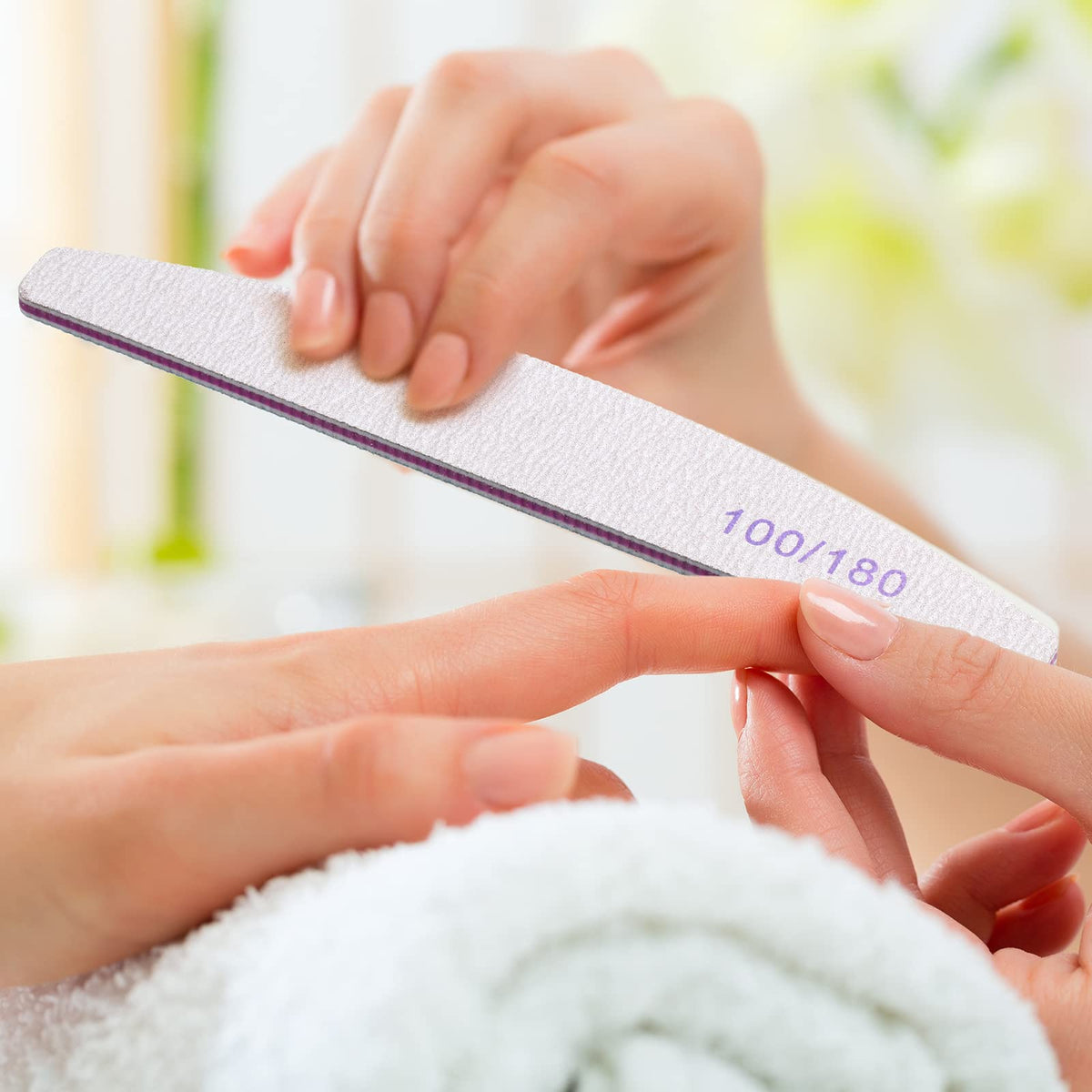 Minatee 100/180 grit dual-sided nail file for fast edge refinement.