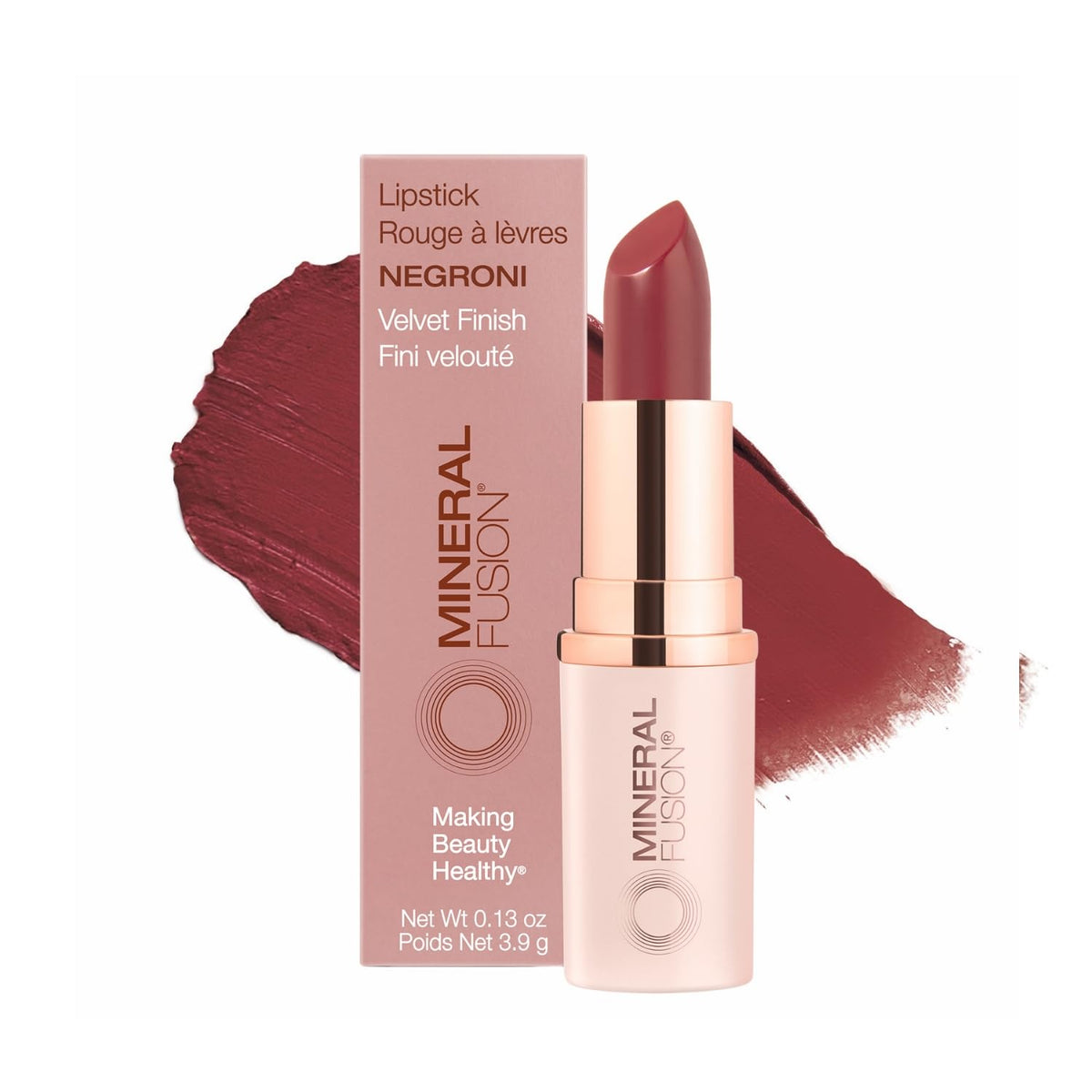 Mineral Fusion Lipstick long-lasting color for vibrant Negroni lips.