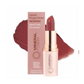 Mineral Fusion Lipstick long-lasting color for vibrant Negroni lips.