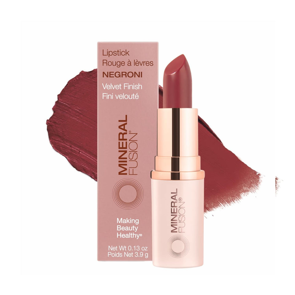 Mineral Fusion Lipstick long-lasting color for vibrant Negroni lips.