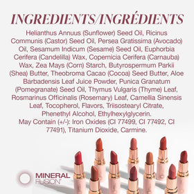 Smooth glide application of Mineral Fusion Plum Wine lipstick on lips.