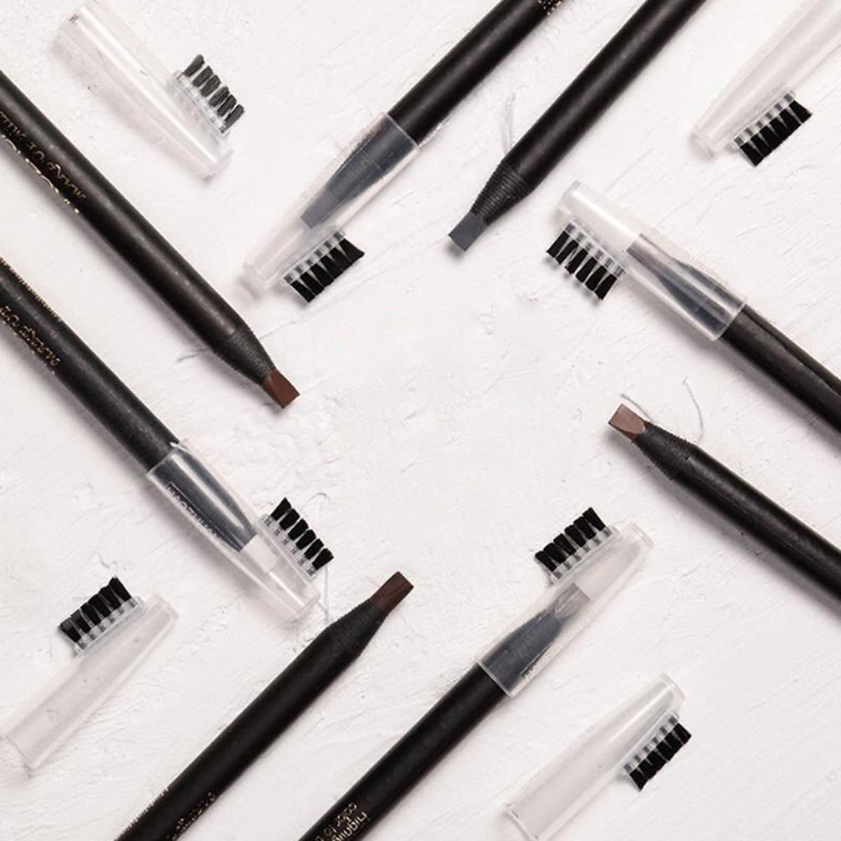Mingran peel-off eyebrow pencils enable quick shape adjustments during sessions.