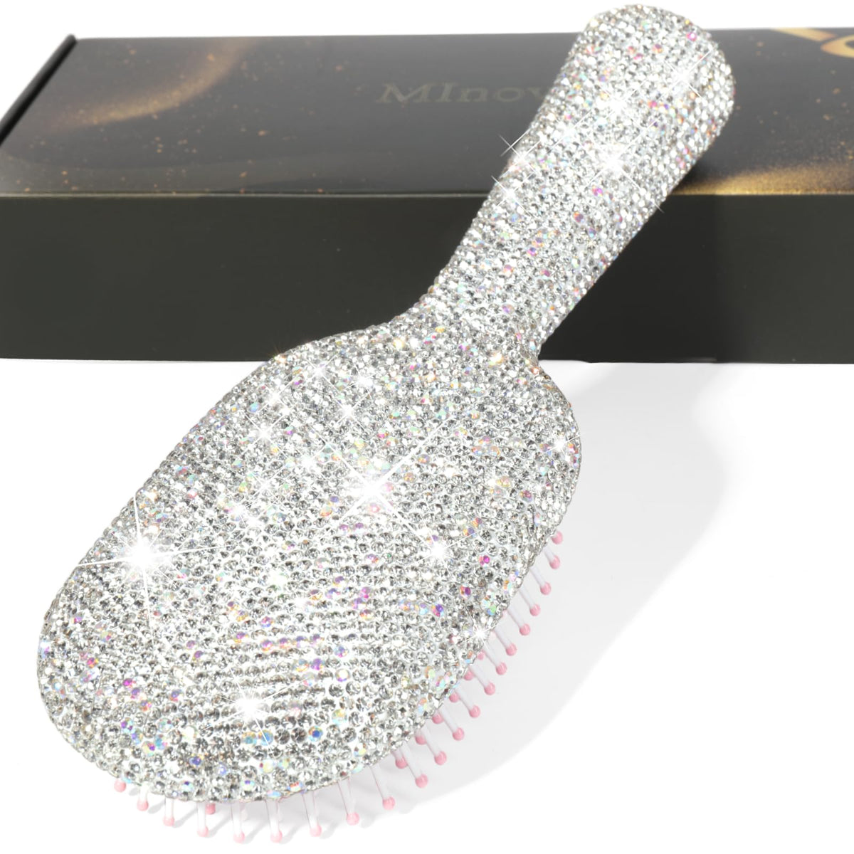 MInovel luxury rhinestone hair brush with paddle close-up and anti-static shimmer.