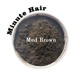 Minute Hair fibers applied to thinning area with natural blend for a fuller look